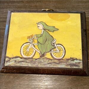 Flavia Weedn 1969 Nun Riding a Bicycle print mounted on 10x13 wood